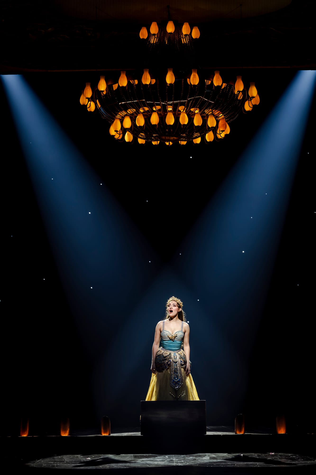 Christine Daaé on stage beneath the chandelier in The Phantom of the Opera