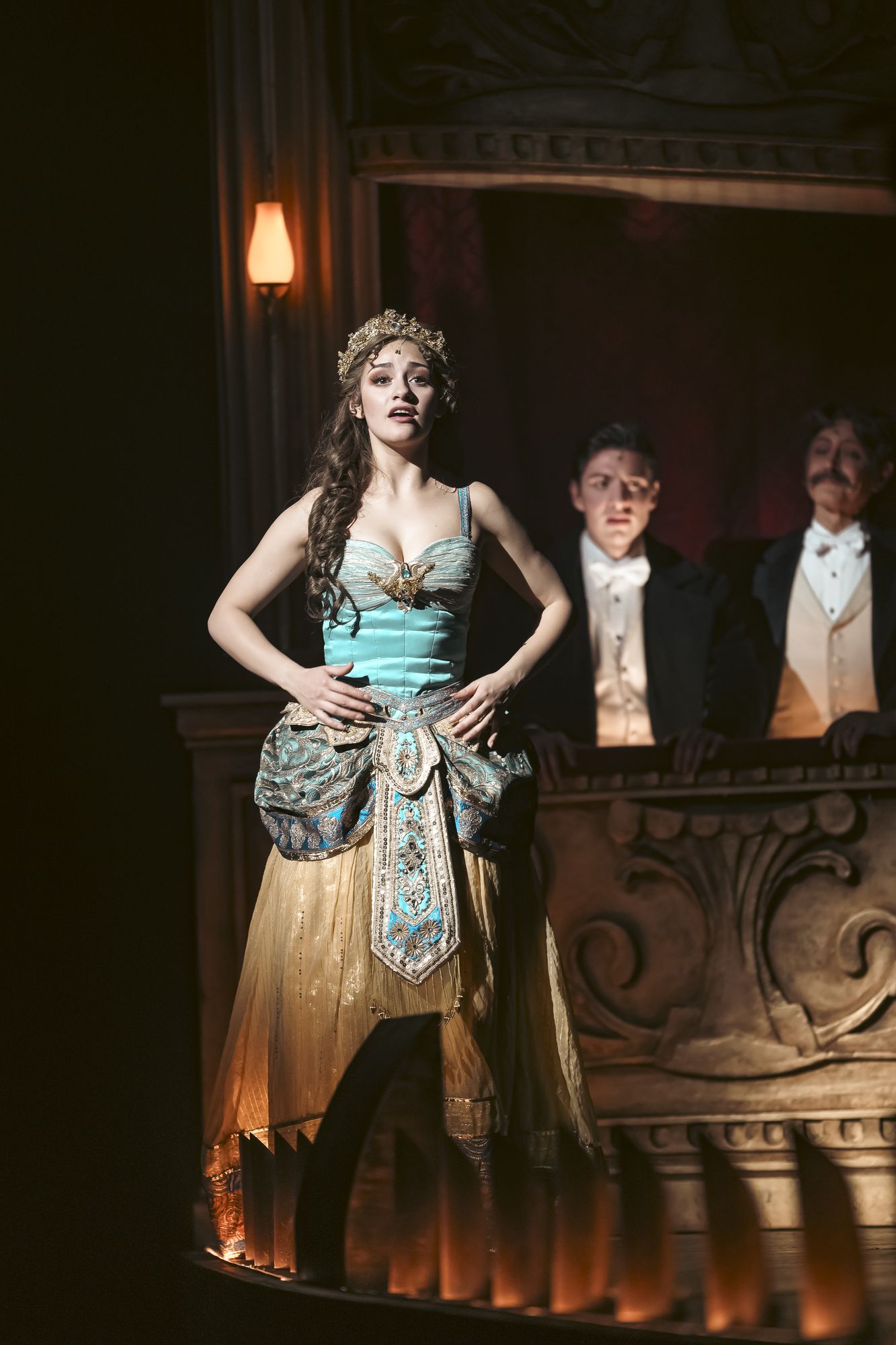 Christine Daaé in the Il Muto costume on the theatre balcony