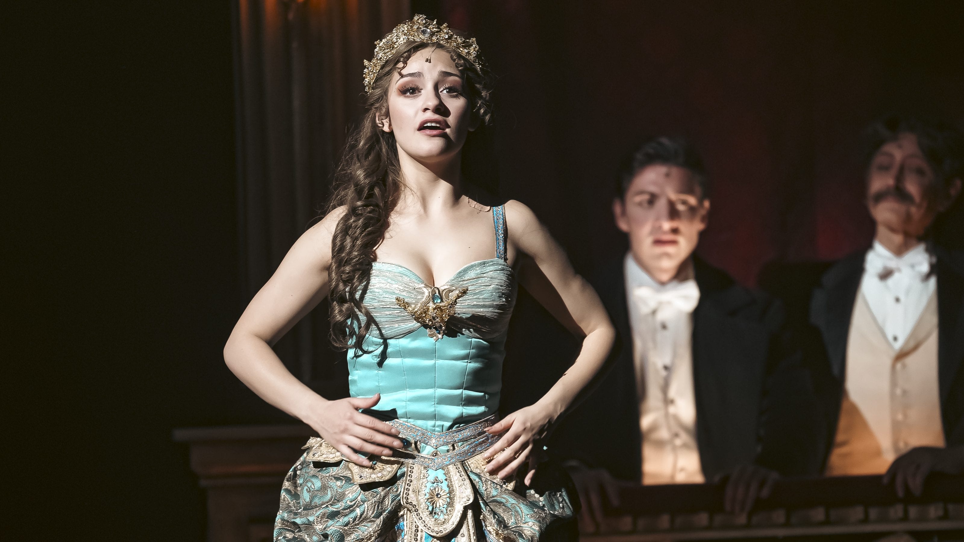 Christine Daaé in the Il Muto costume on the theatre balcony